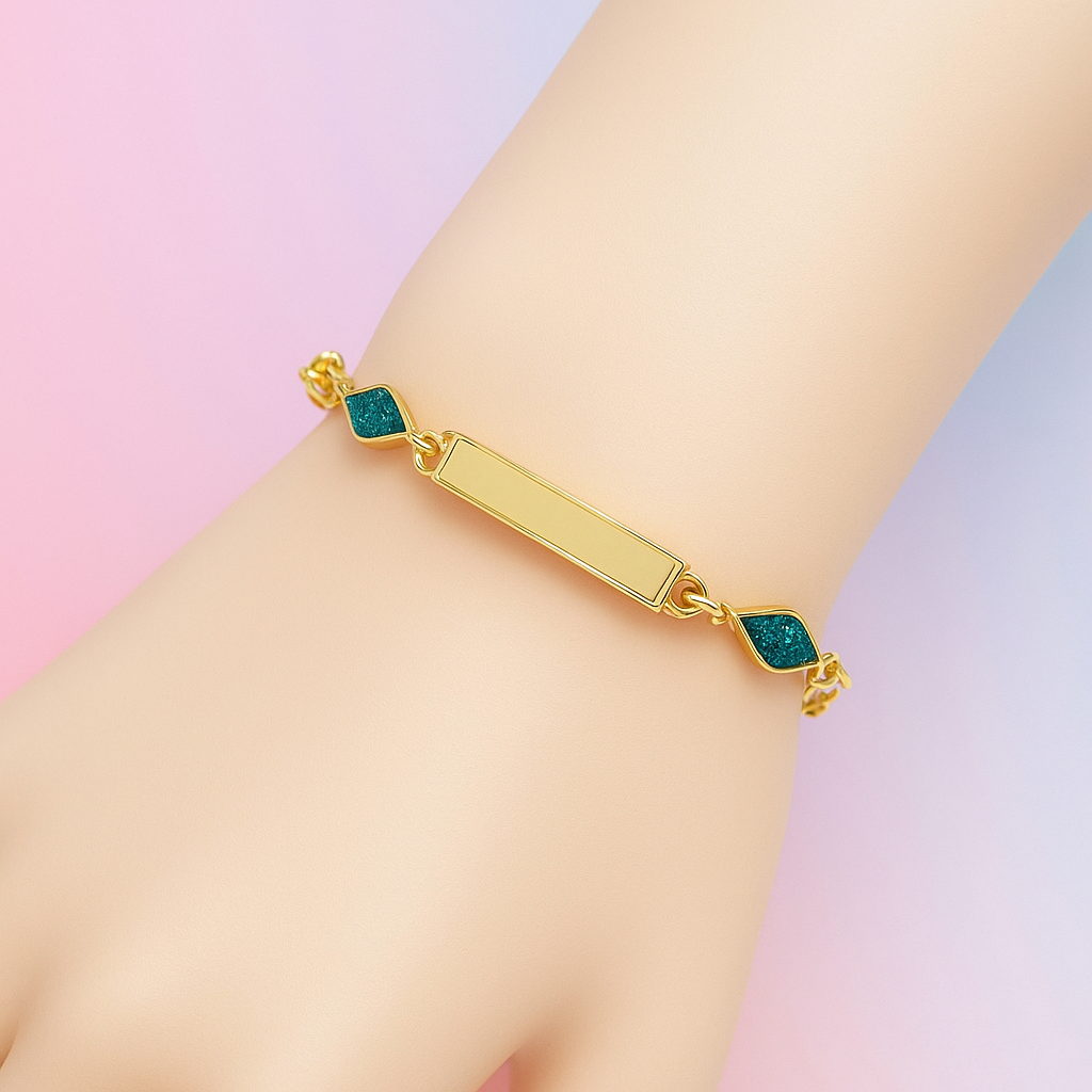 Gold bracelet with green gemstones on a pastel background