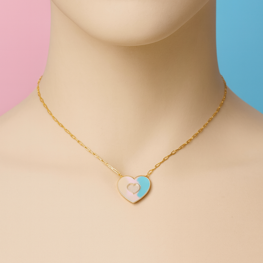 Mannequin wearing a gold necklace with a heart-shaped pendant on a pink and blue background