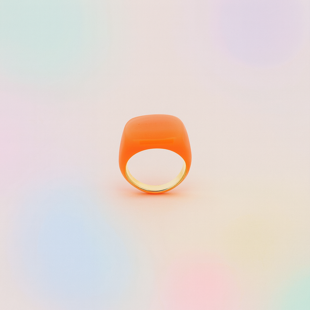 Orange ring with a white center on a gradient background