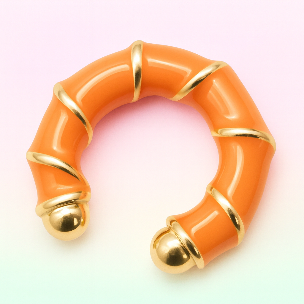 Orange ring with gold accents on a gradient background