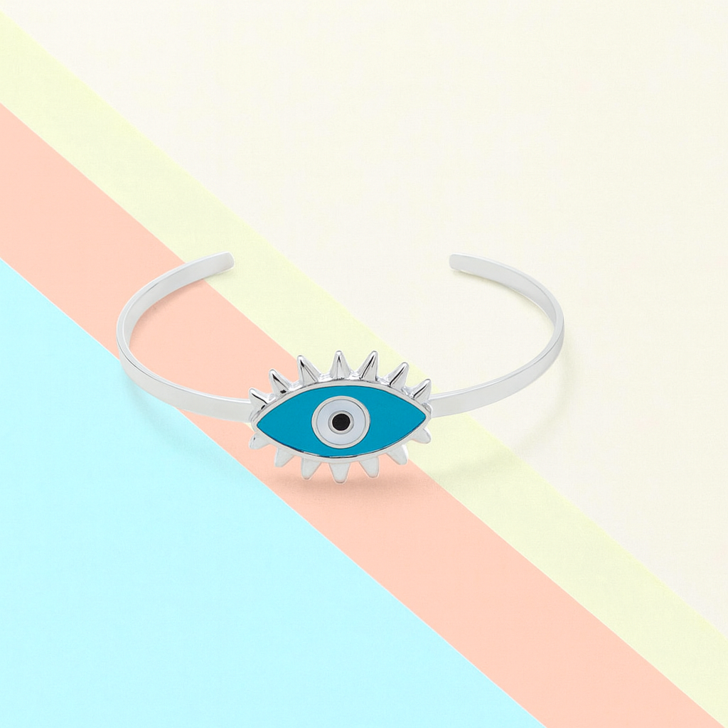 Headband with blue eye design on a pastel striped background