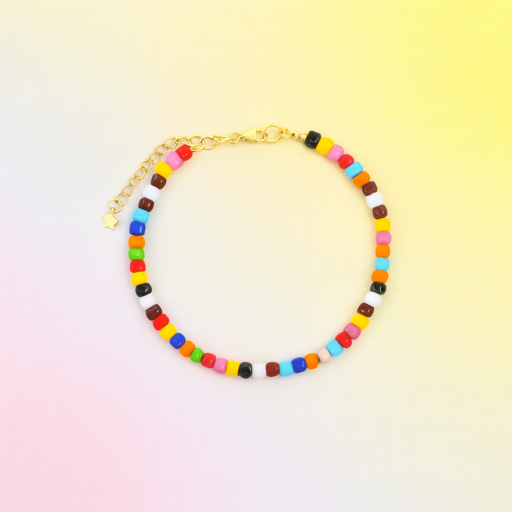 Colorful beaded bracelet on a gradient background